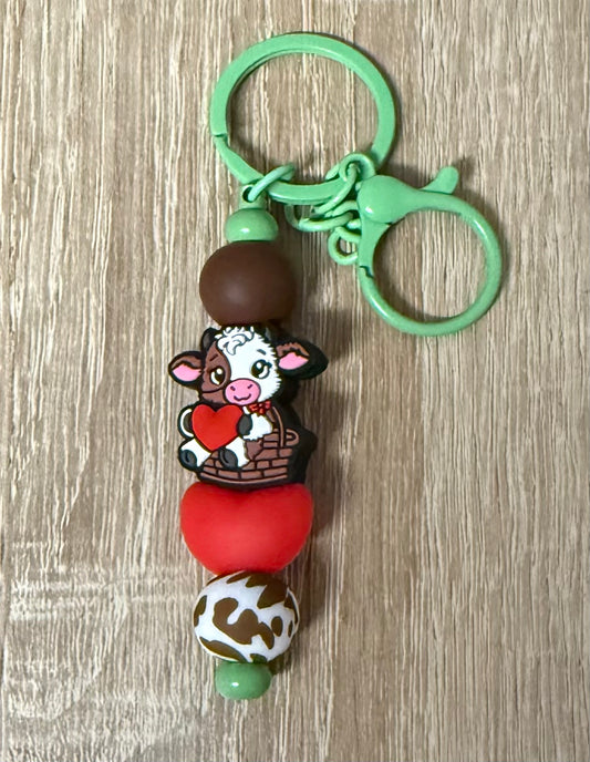 Schlüsselanhänger Kuh grün