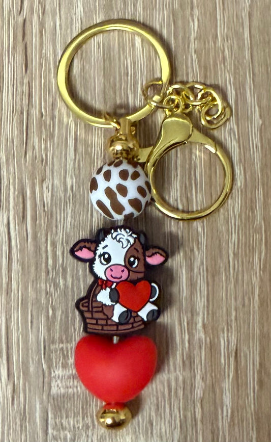 Schlüsselanhänger Kuh gold